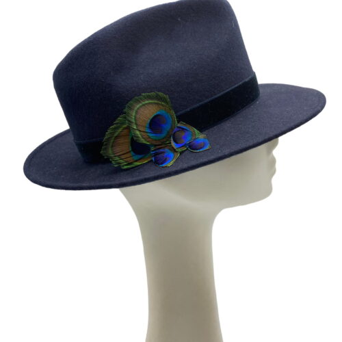 Fabulous navy millinery made headpiece with simple peacock feather detail to finish.